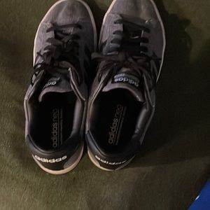 Adidas grey/black tennis shoes.